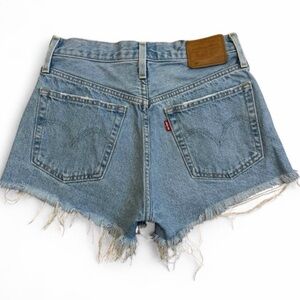 Levis premium 501 women’s light wash raw hem jean shorts